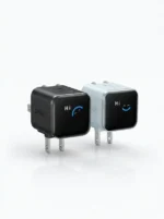 Black and white Anker Nano 45W GaN Fast Charger with Smart Display (A121D) units featuring a digital "Hi" greeting.
