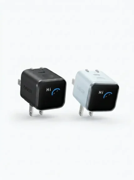 Black and white Anker Nano 45W GaN Fast Charger with Smart Display (A121D) units featuring a digital "Hi" greeting.