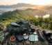 Essential travel gadgets including power bank, camping fan, headlamp and waterproof speaker packed for a 3-day Bandarban trip trekking trip in Bangladesh