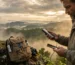 Traveler using a high-capacity travel power bank during an outdoor adventure in Bandarban, Bangladesh.