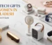 Premium collection of tech gifts for women featuring smartwatches, wireless headphones, rechargeable fan, mini air cooler, decorative lighting, and creator accessories.